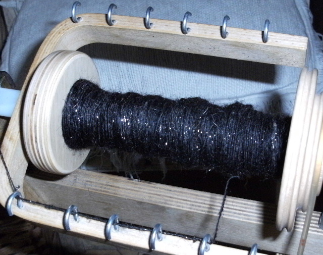 Black wool spun up with silver Mylar - thank you, Carolyn!