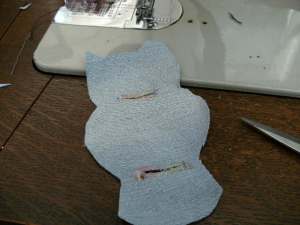 Buttonhole around the tie slits, then cut through